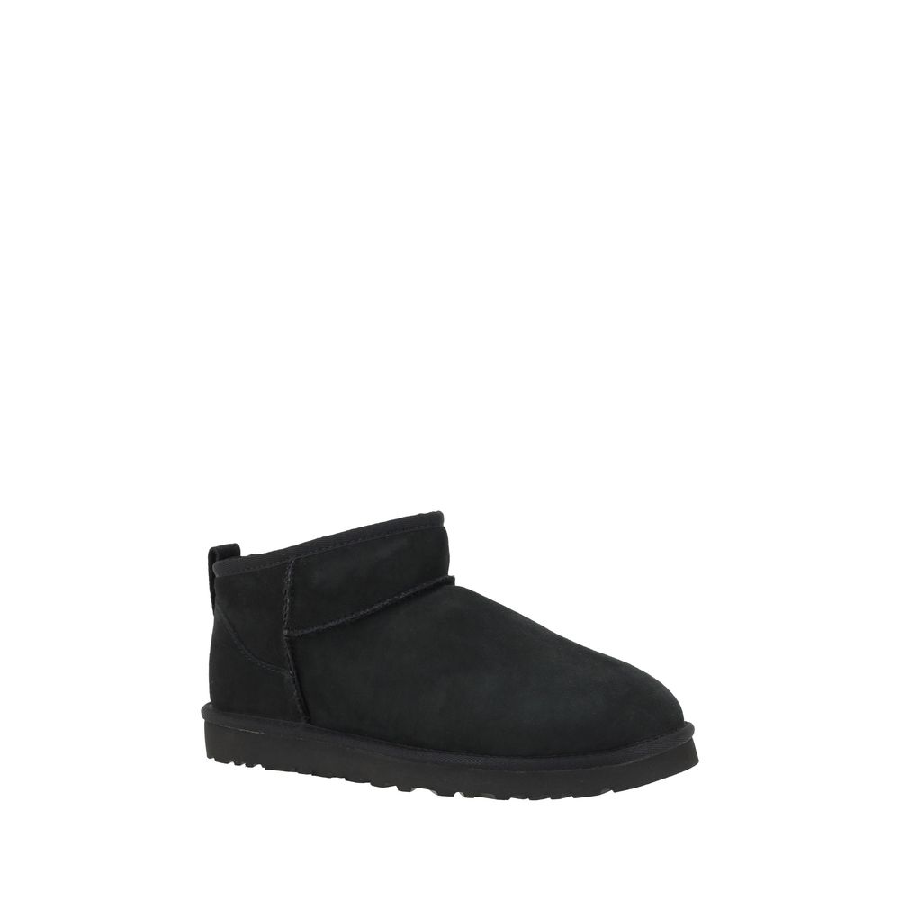Alt Tag: UGG Black Goatskin Ankle Boots with shearling lining and knurled sole for grip and durability, featuring iconic monogram on heel.