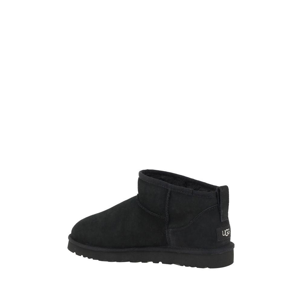 UGG Black Goatskin Ankle Boots with knurled sole, shearling lining, and iconic monogram, showcasing style and comfort.
