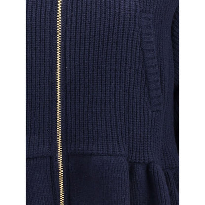 Undercover Blue Wool Bomber close-up showing flared hem and textured wool fabric with front zipper detail for AW25 collection.