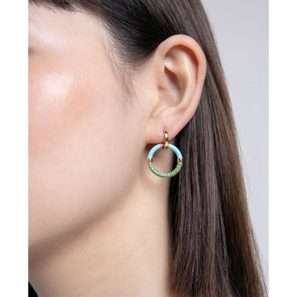 Lady wearing VICEROY JEWELS Mod. 13199E100-99 silver earrings, mineral case, water resistant 10 ATM, multifunction, elegant design.