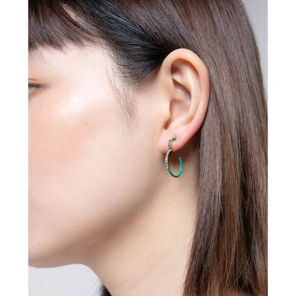 Woman wearing VICEROY JEWELS Mod. 15119E100-92 earrings featuring silver 925° material in an elegant design.
