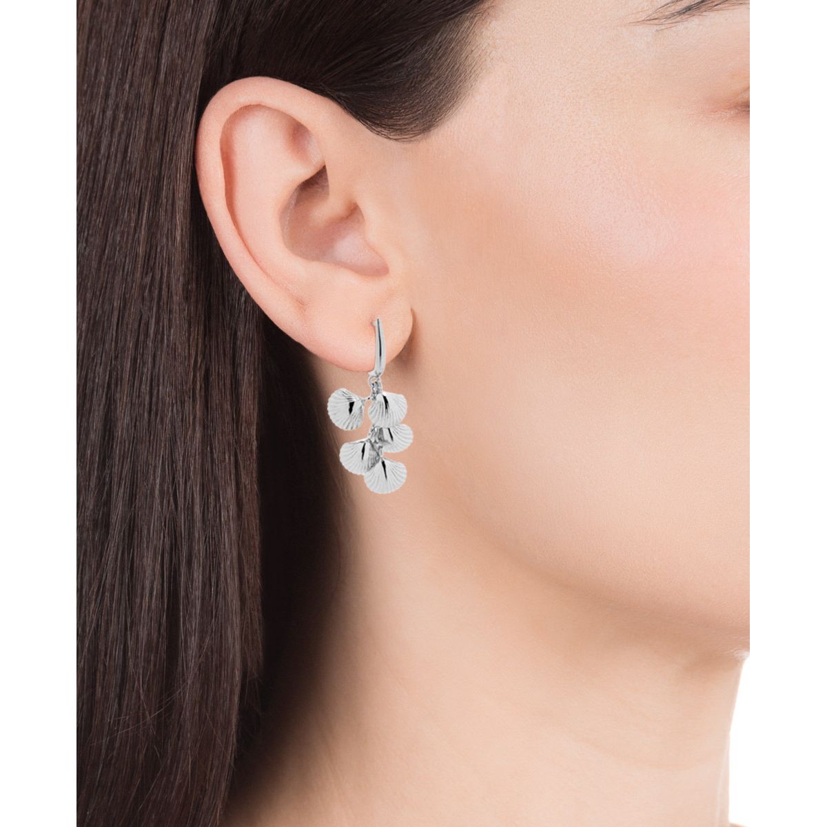Woman wearing VICEROY JEWELS Mod. 61070E000-00 silver 925° earrings, showcasing elegant design with floral motifs, perfect for ladies.