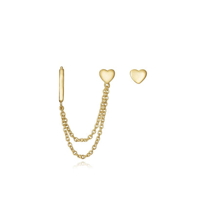 Gold earrings with chain and heart design, elegant style for women.