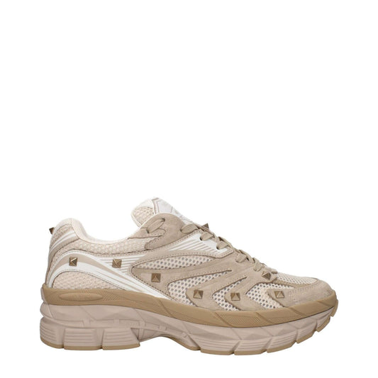 Valentino Garavani Beige Fabric Low Top Sneakers with front and back logos, studs, and lace-up closure.