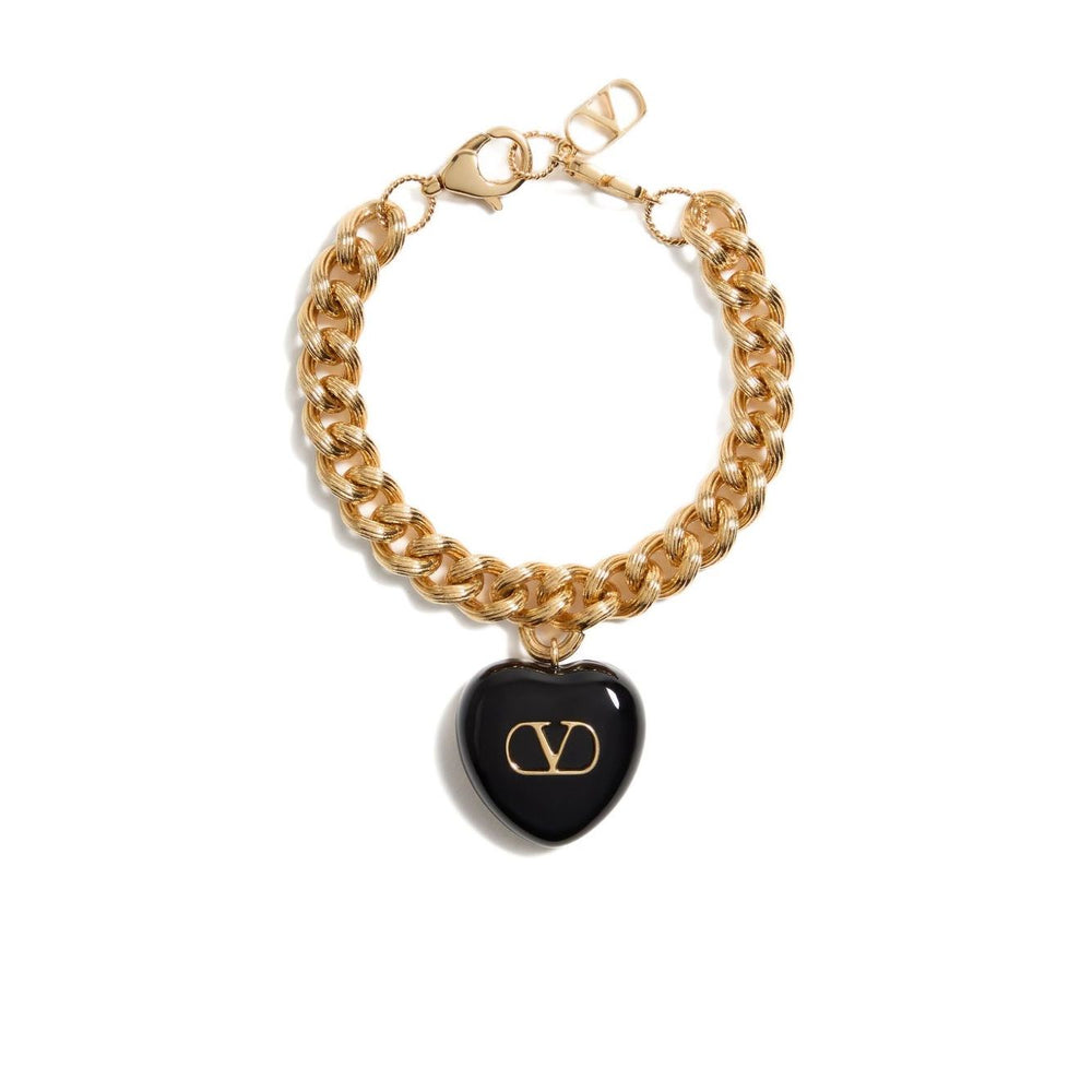 Valentino Garavani Coeur Royal Bracelet with black heart charm, logo engraving, and chunky chain design.