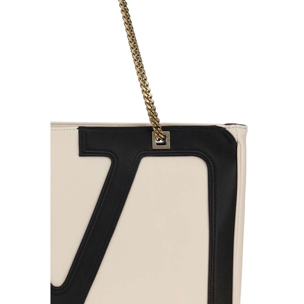 Valentino Garavani Cream Calf Leather Bos Taurus Shoulder Bag with iconic VLogo and chain handle detail.