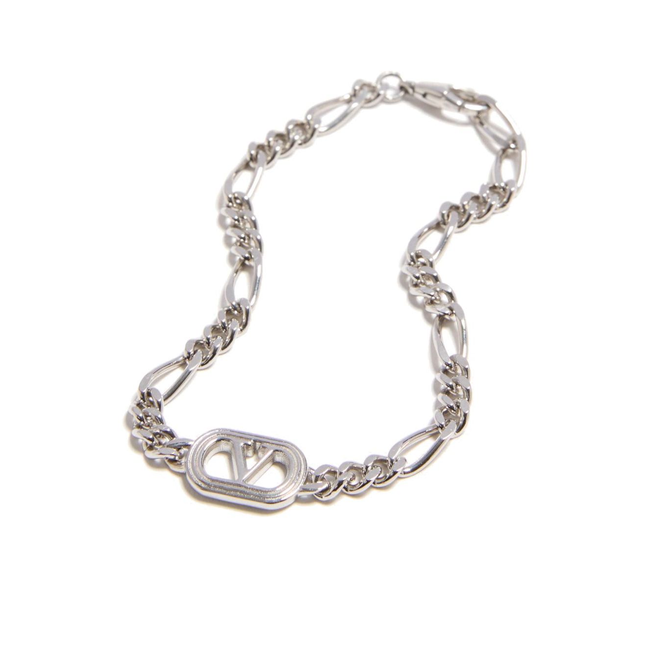 Valentino Garavani Ovalette Bracelet with silver-tone curb chain and VLogo Signature displayed on a clasp.
