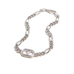 Valentino Garavani Ovalette Bracelet with silver-tone curb chain and VLogo Signature displayed on a clasp.