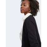 Woman wearing Vila Clothes Black Viscose Cardigan with white shirt, displaying elegant style and comfort.