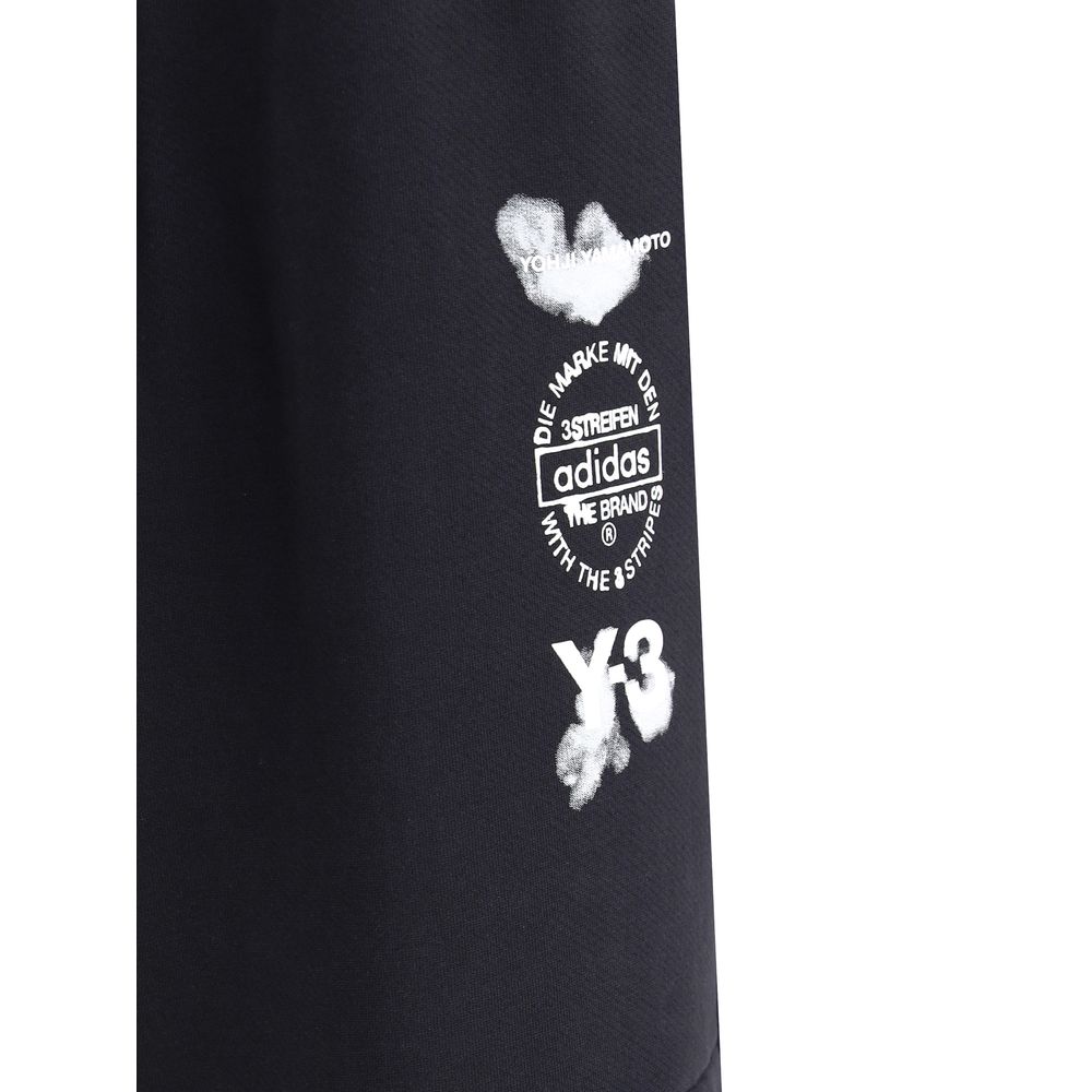Close-up of Y-3 Black Cotton Joggers featuring logo design on leg.