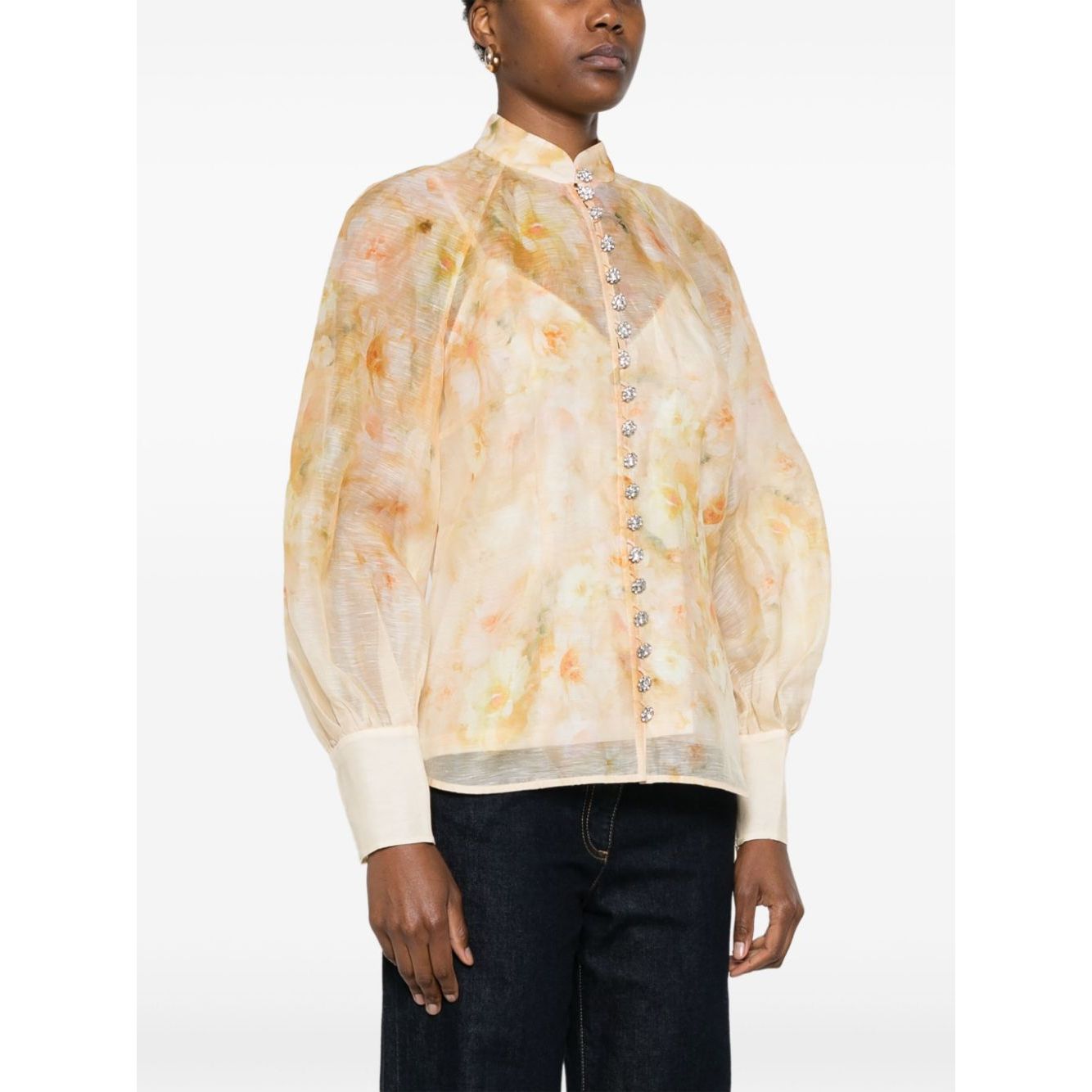 Zimmermann Crush Shirt in light yellow with floral print and crystal buttons, featuring a band collar and puff sleeves. Eco-friendly fashion piece.